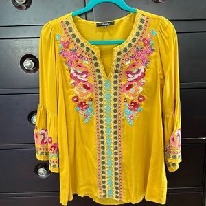 Mustard Embroidered Top with bell sleeve detail.